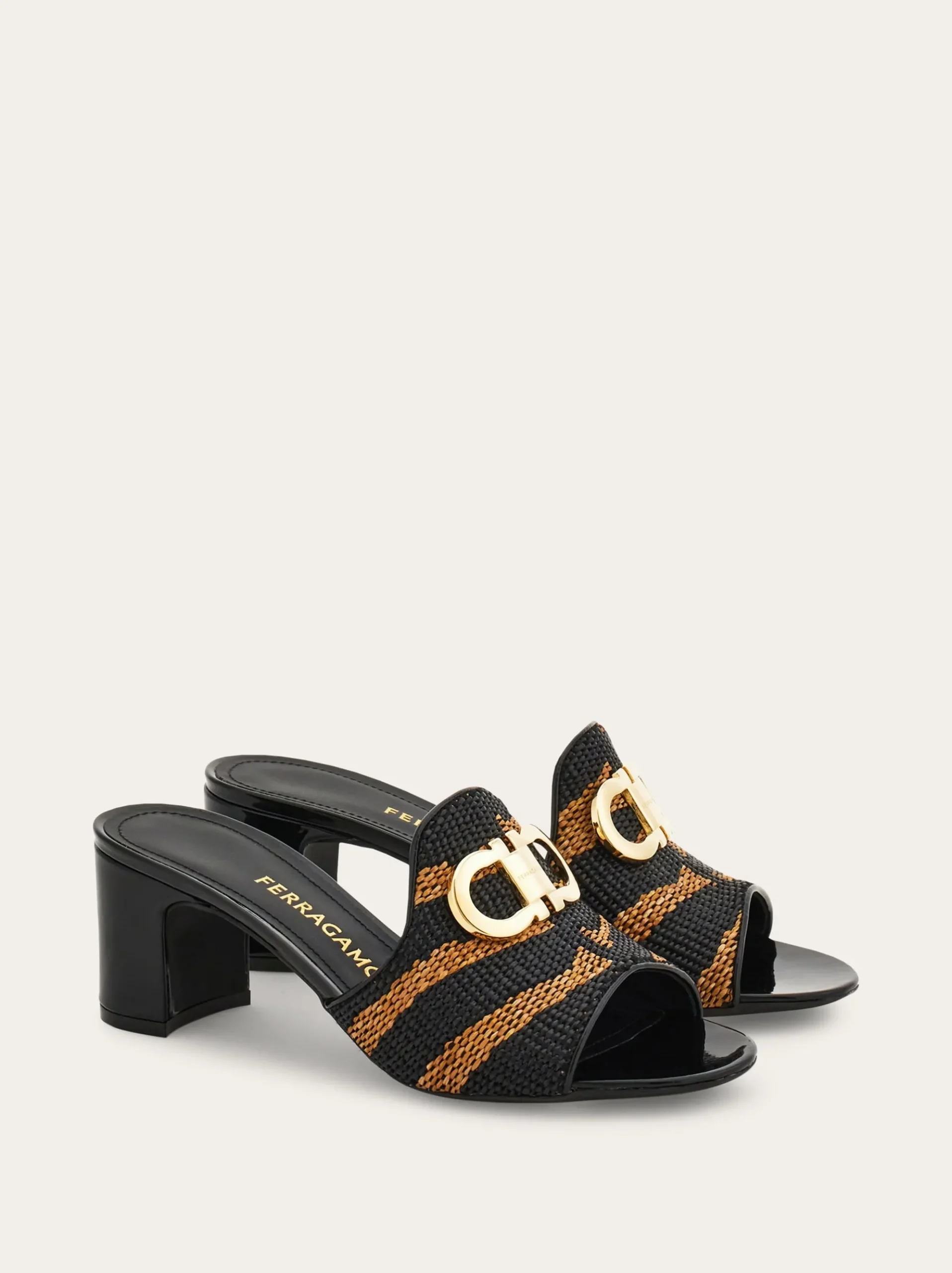 Gancini ornament mid-heel Slide - Women